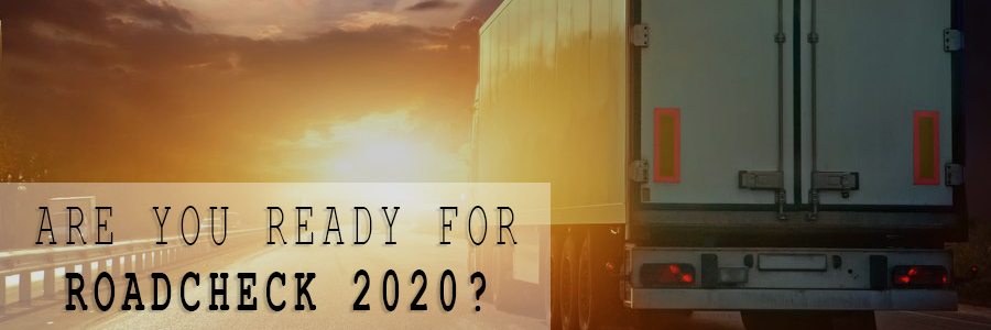 Semi truck driving into the sunset with text reading "Are You Ready For Road Check 2020?"